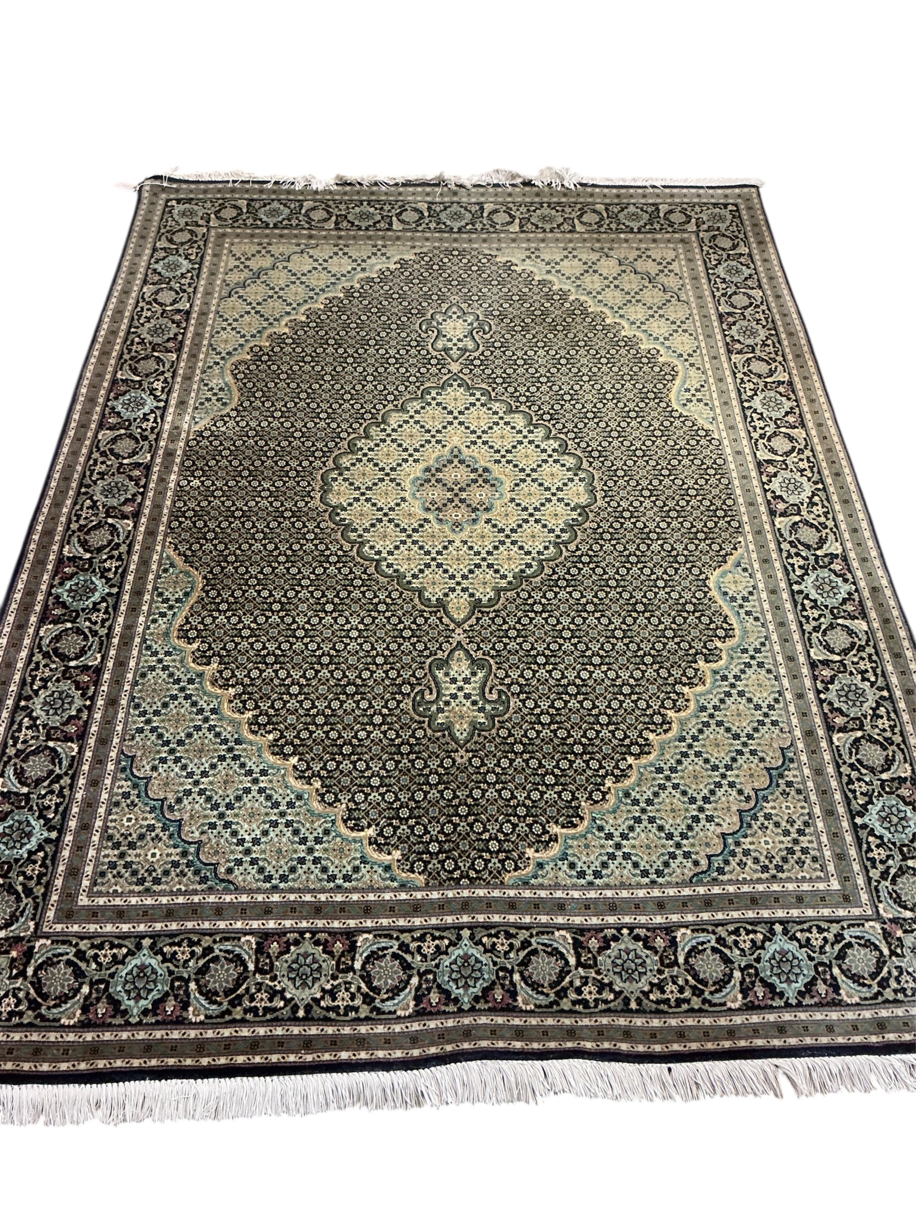 A North West Persian Shiraz blue ground rug, 208 x 153cm